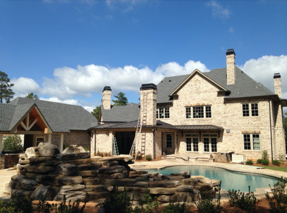 Roofing company team receiving an industry award for quality service.