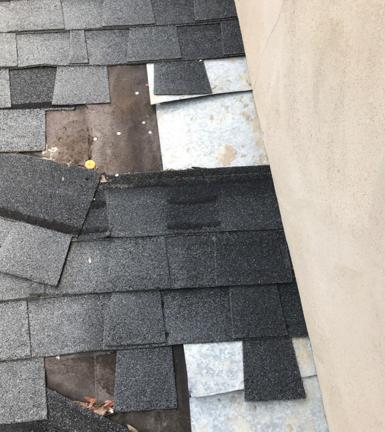 Roofing company team receiving an industry award for quality service.